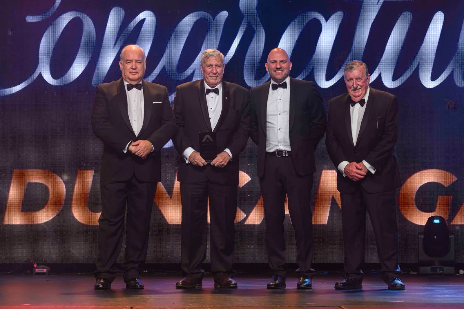 Personality of the Year winner Hon. Duncan Gay AM accepting his award with (l-r) Peter Anderson, Ross Greig of CMV Truck & Bus and Dennis Ryan. Image: AFIA