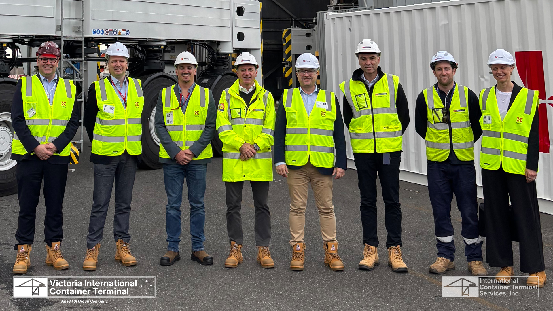 Bruno Porchietto (fourth from left), VICT chief executive, and Sami Niiranen (fifth from left), Kalmar chief executive officer, with other VICT and Kalmar personnel during the official handover of the new automatic container carriers. Credit: VICT/ICTSI