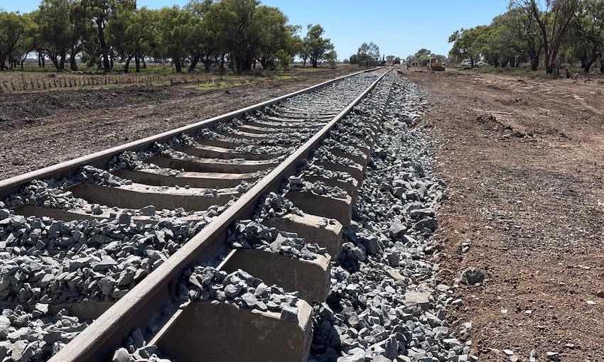 Flood-damaged east-west rail line restored