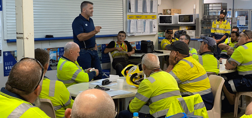 Shane Webcke speaks with workers