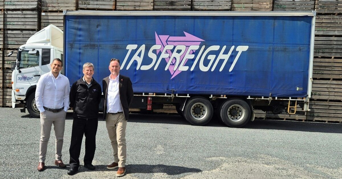Brynn Beetge (l) and Adam Bowles (r) from OneAdvanced with Tasfreight's Stuart Nicholls (centre). Image: Tasfreight