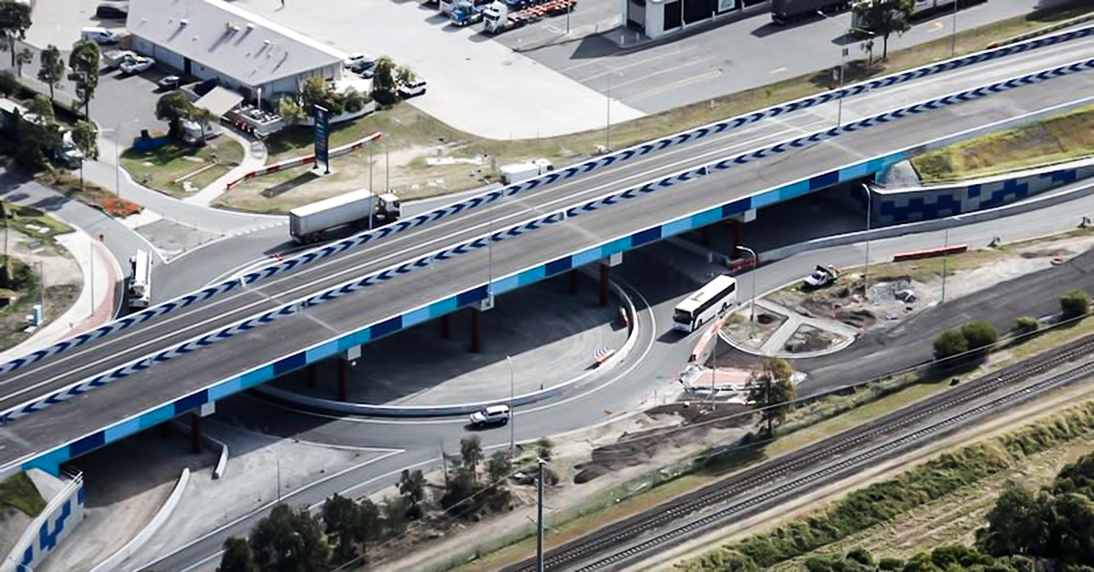 A prime mover and container fully engulfed in flames on Port Drive Brisbane