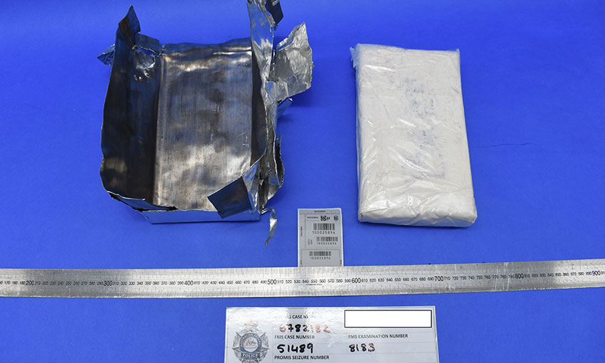 Two Sydney men were arrested for importing cocaine via air freight